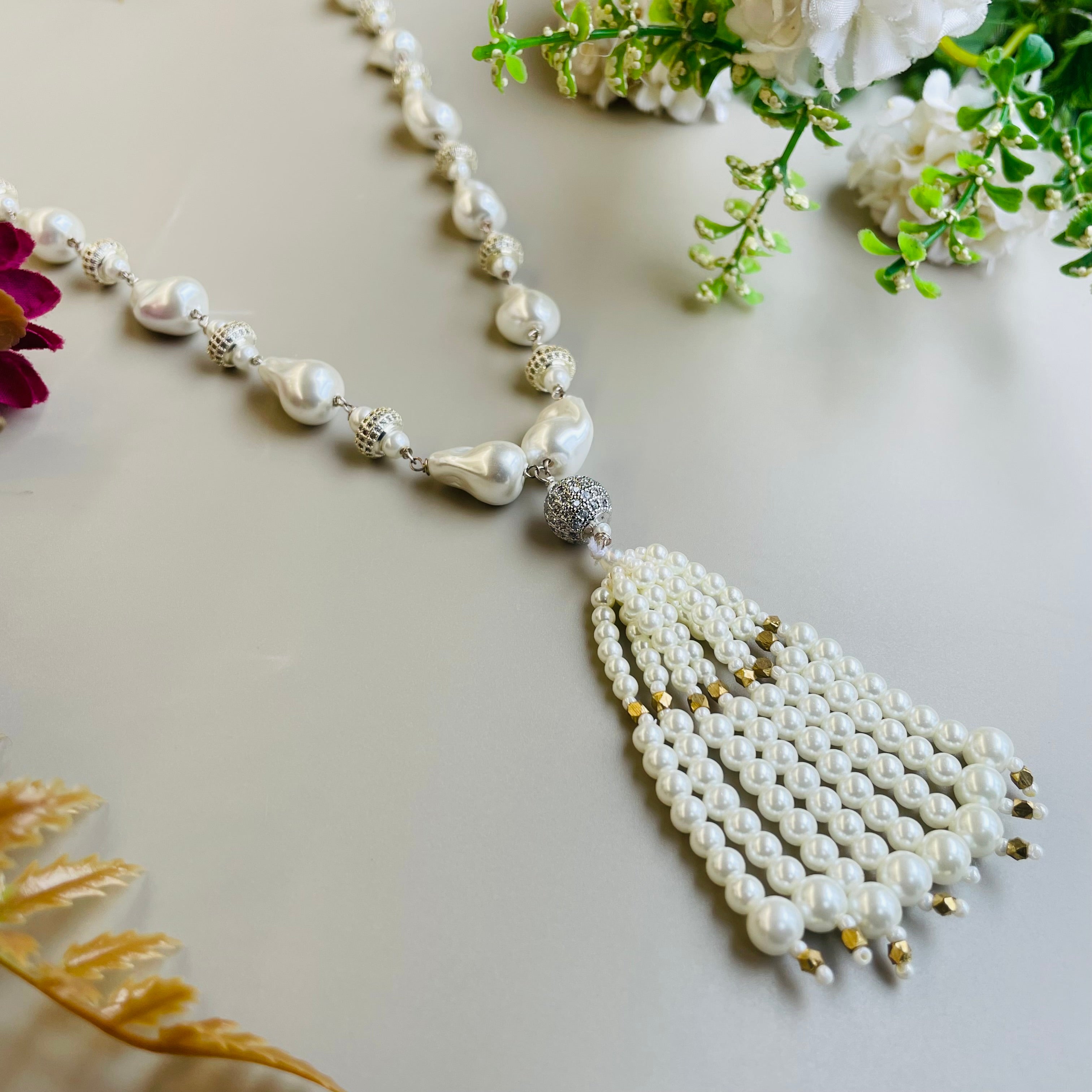 Ad Navya pearl mala