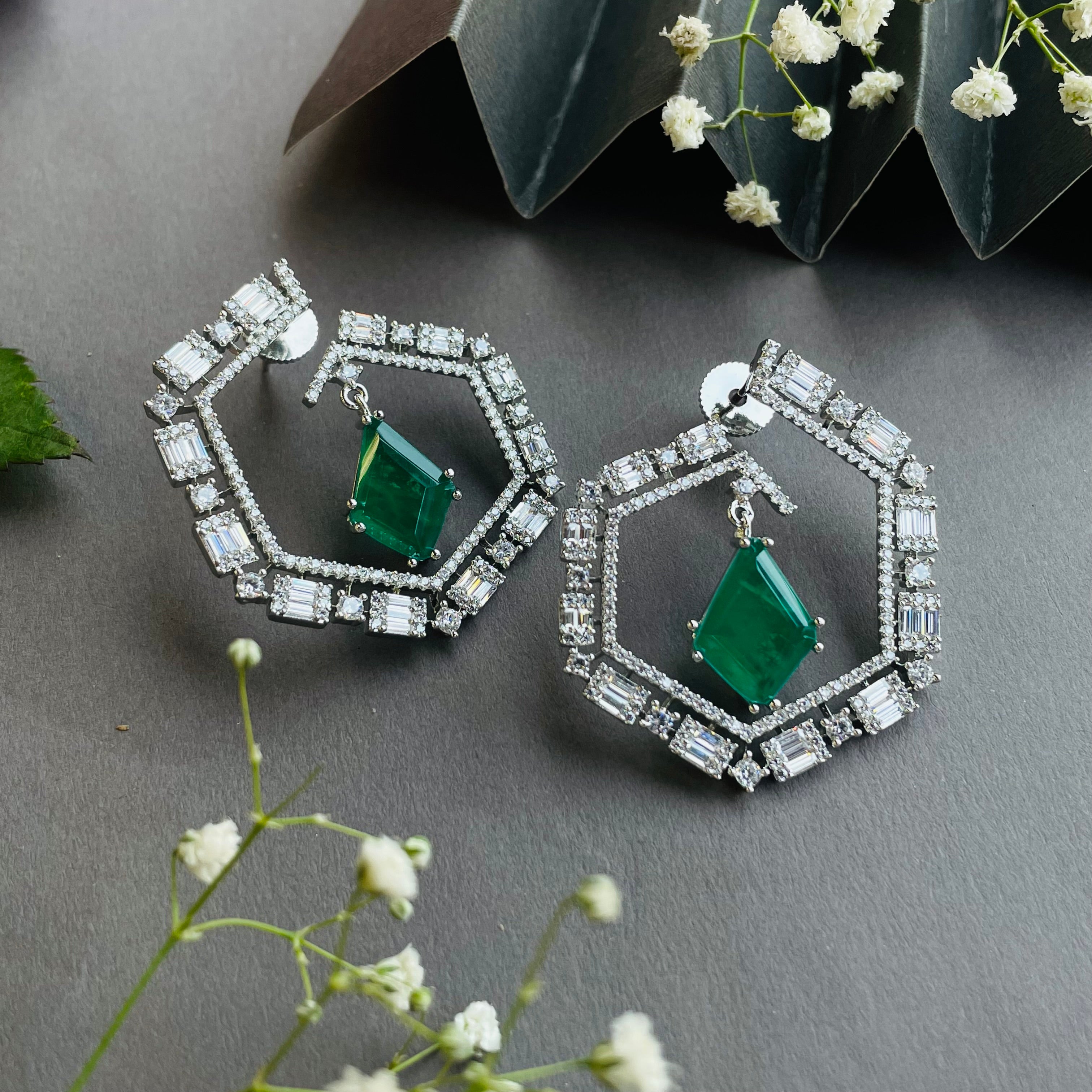 Ad Della earrings