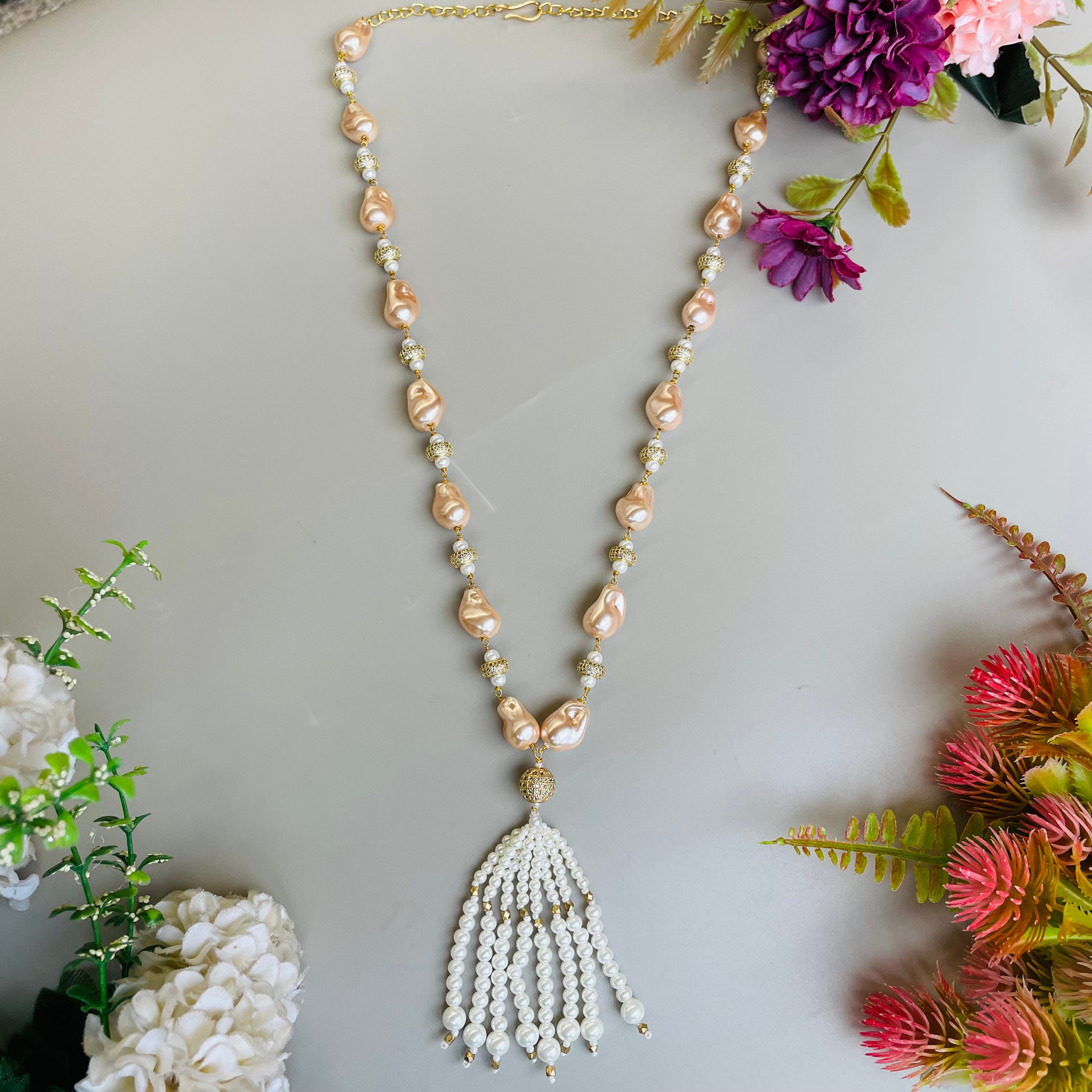 Ad Navya pearl mala