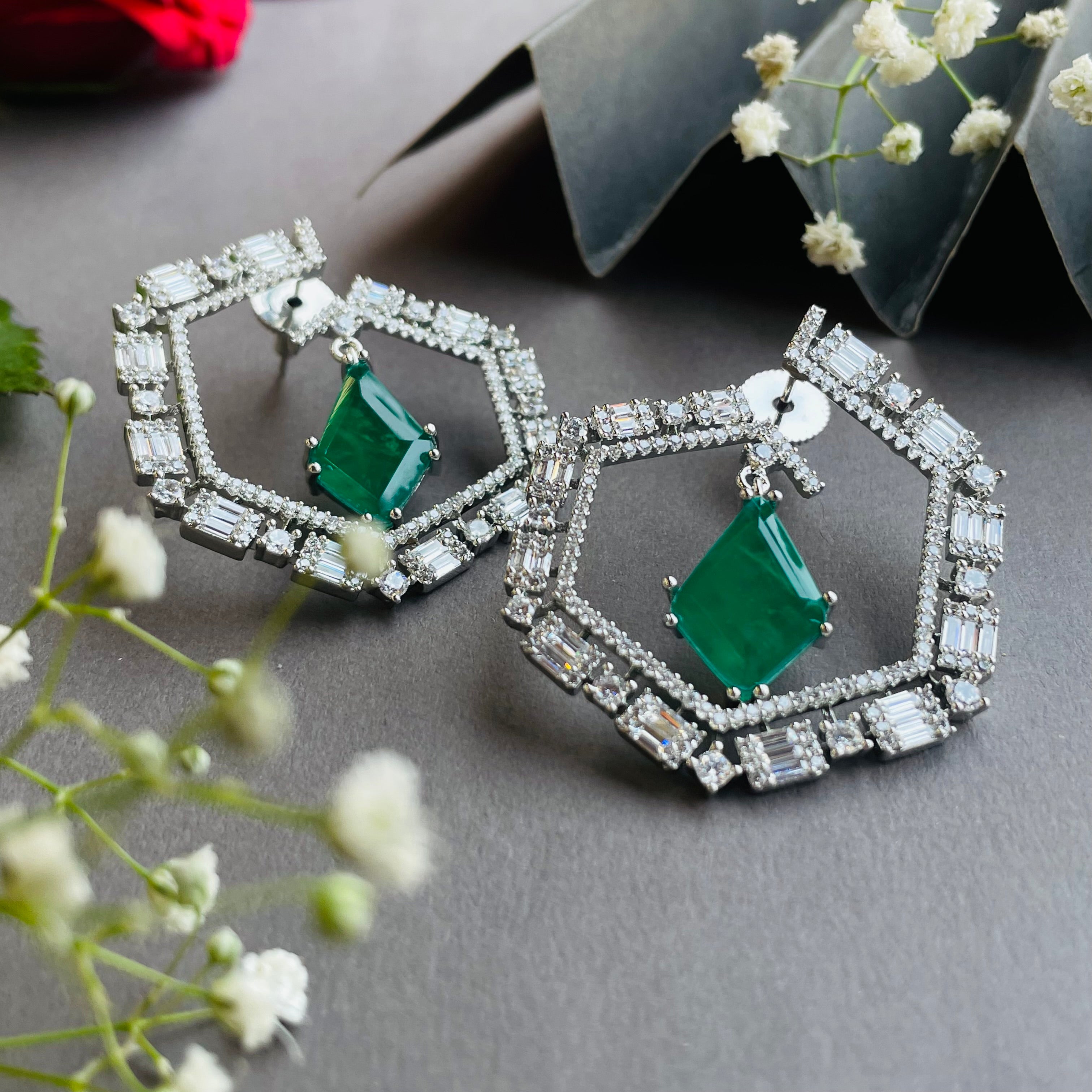 Ad Della earrings