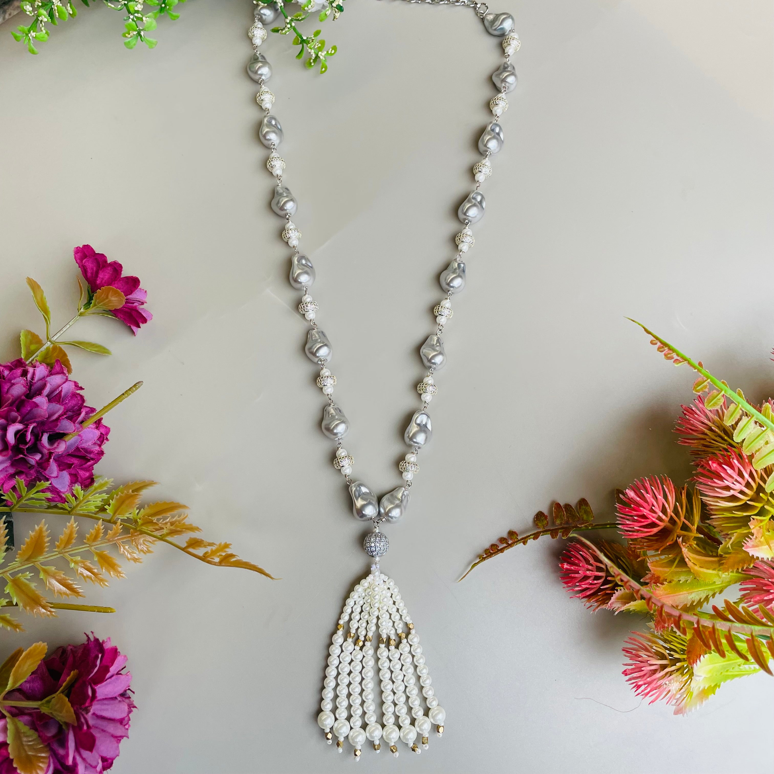 Ad Navya pearl mala