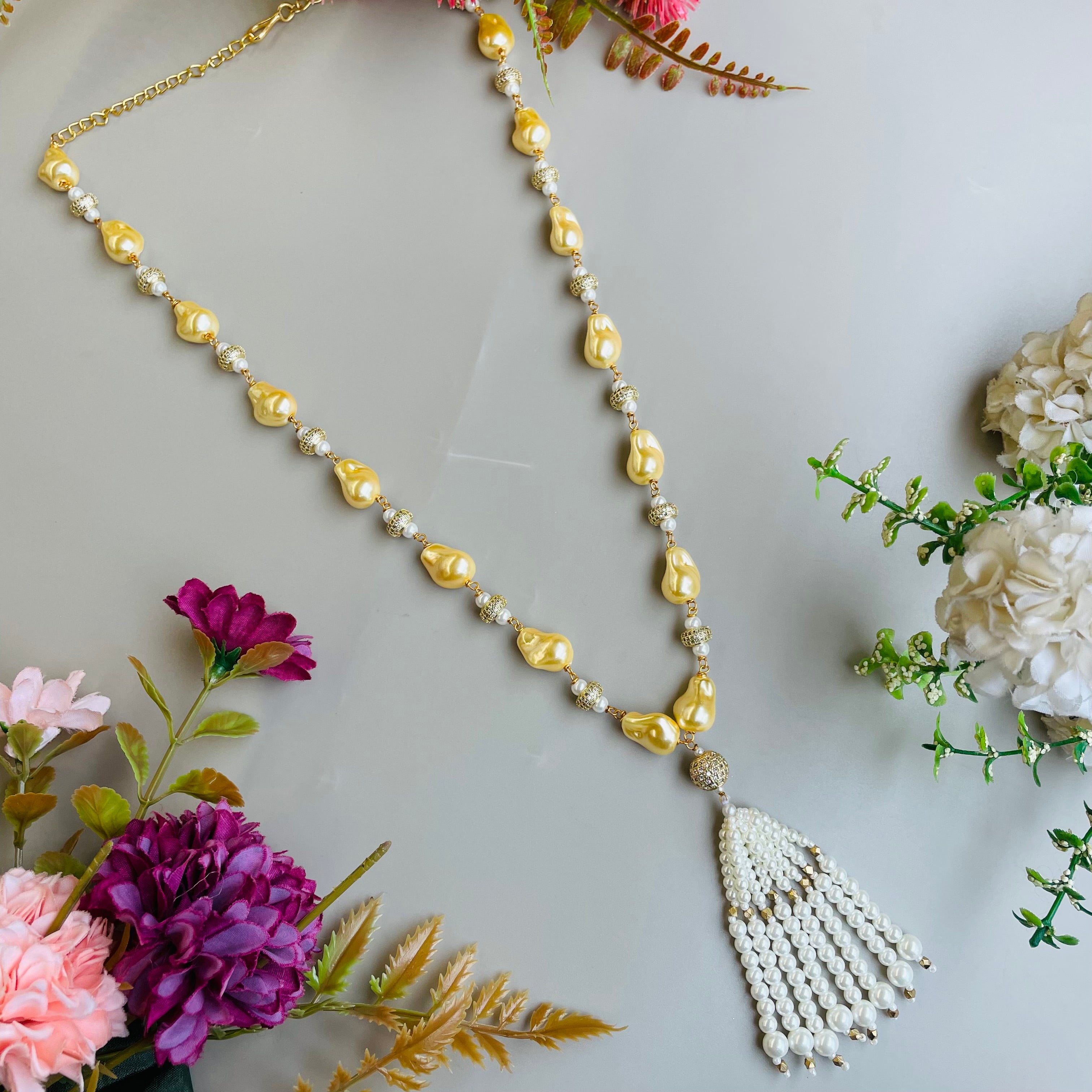 Ad Navya pearl mala