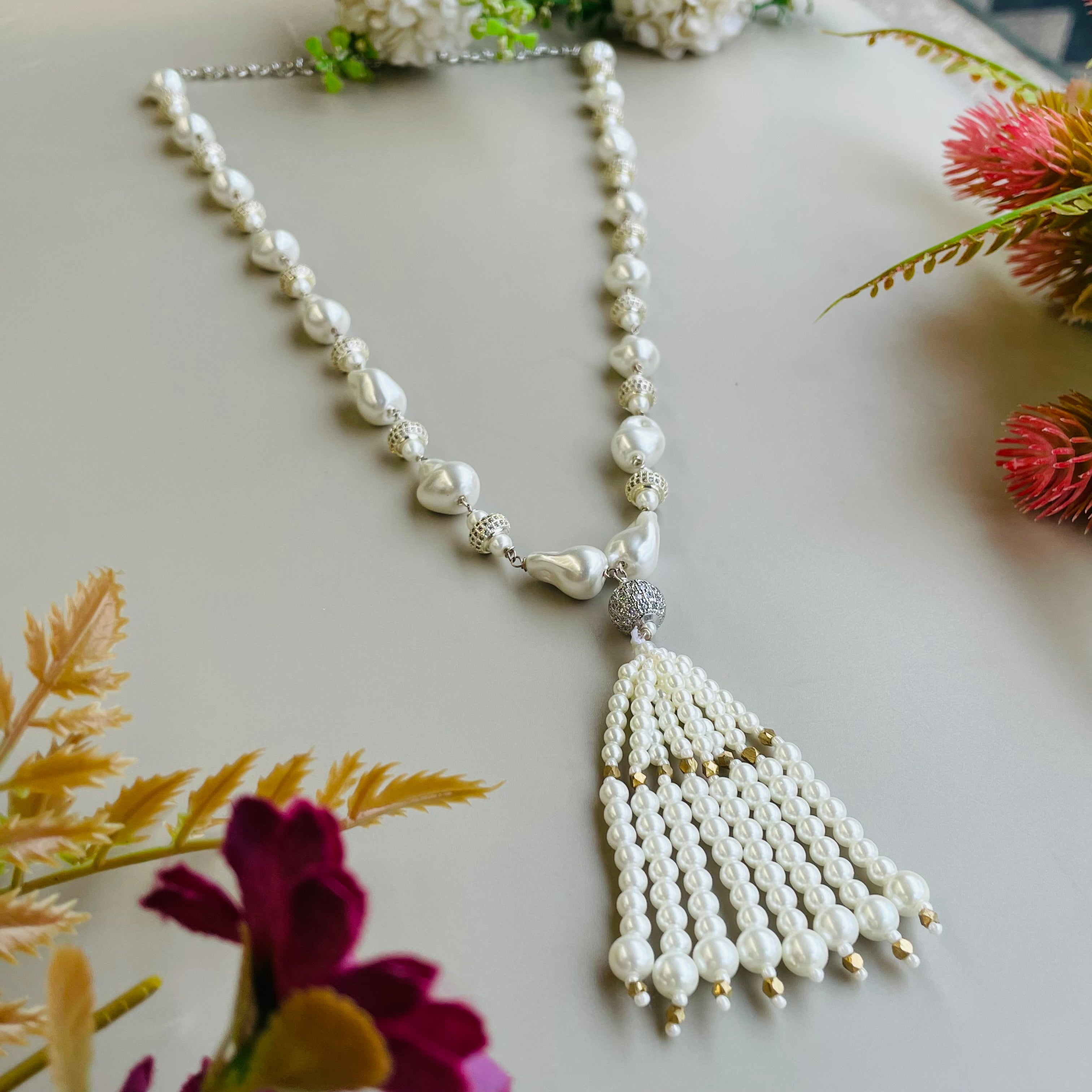 Ad Navya pearl mala