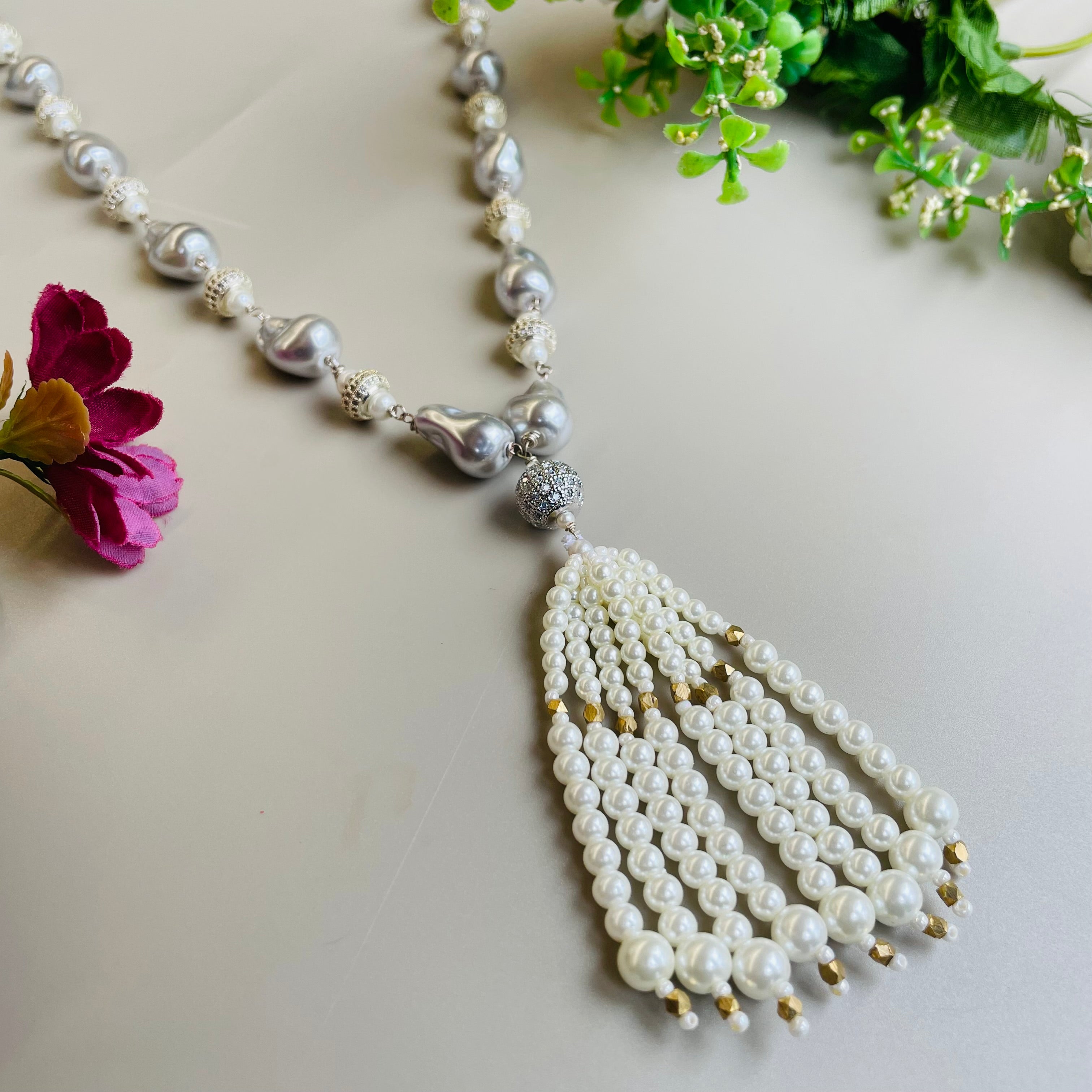Ad Navya pearl mala