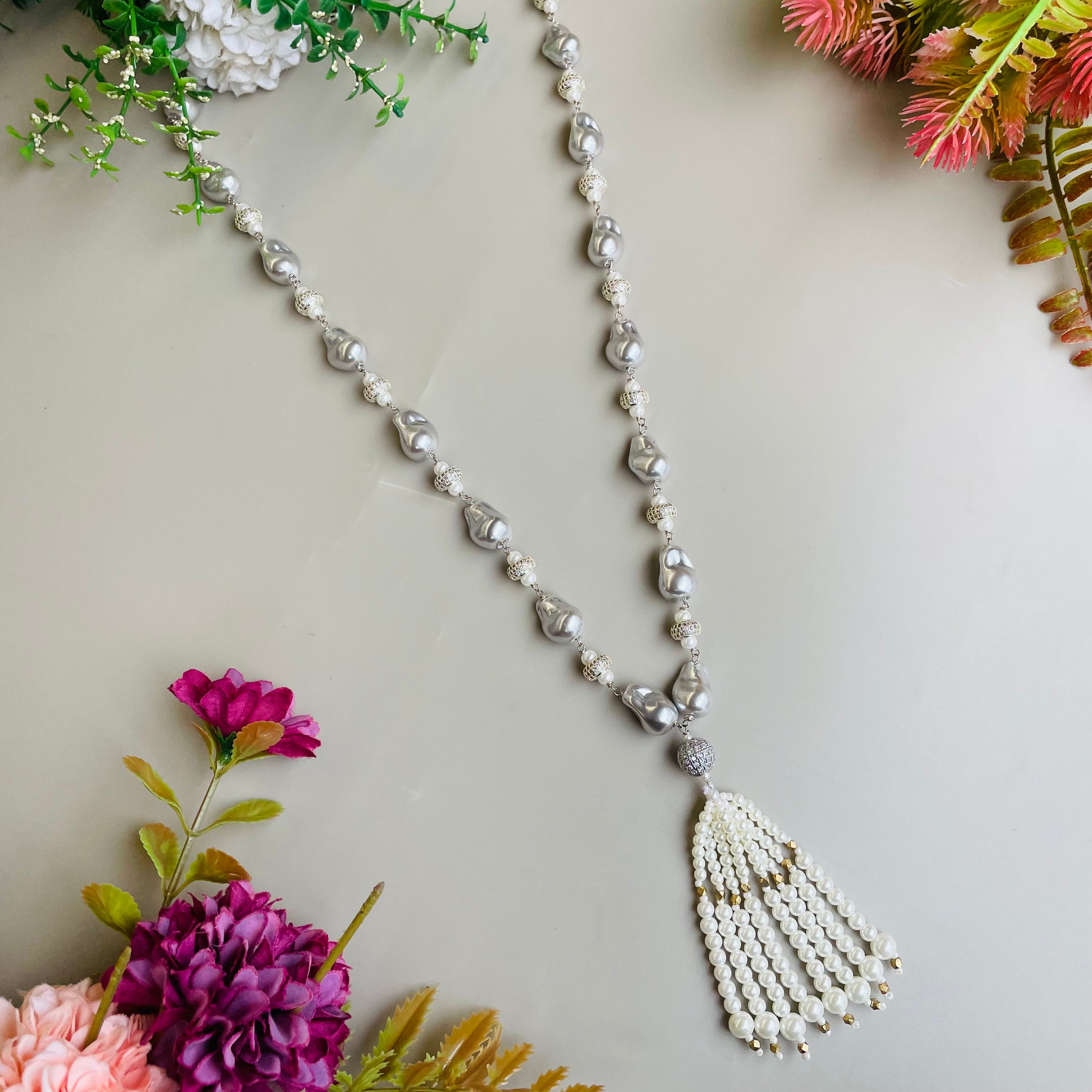 Ad Navya pearl mala
