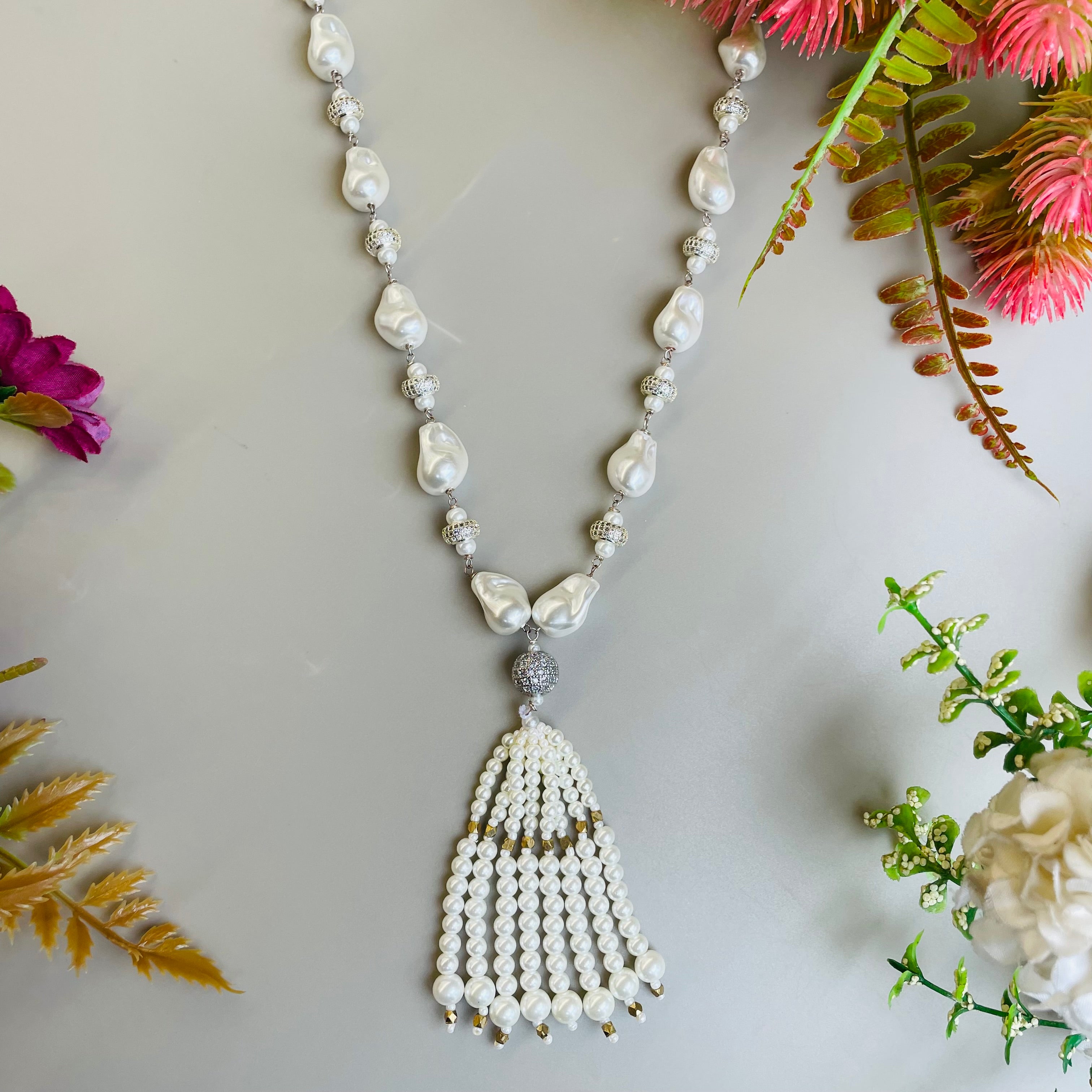 Ad Navya pearl mala