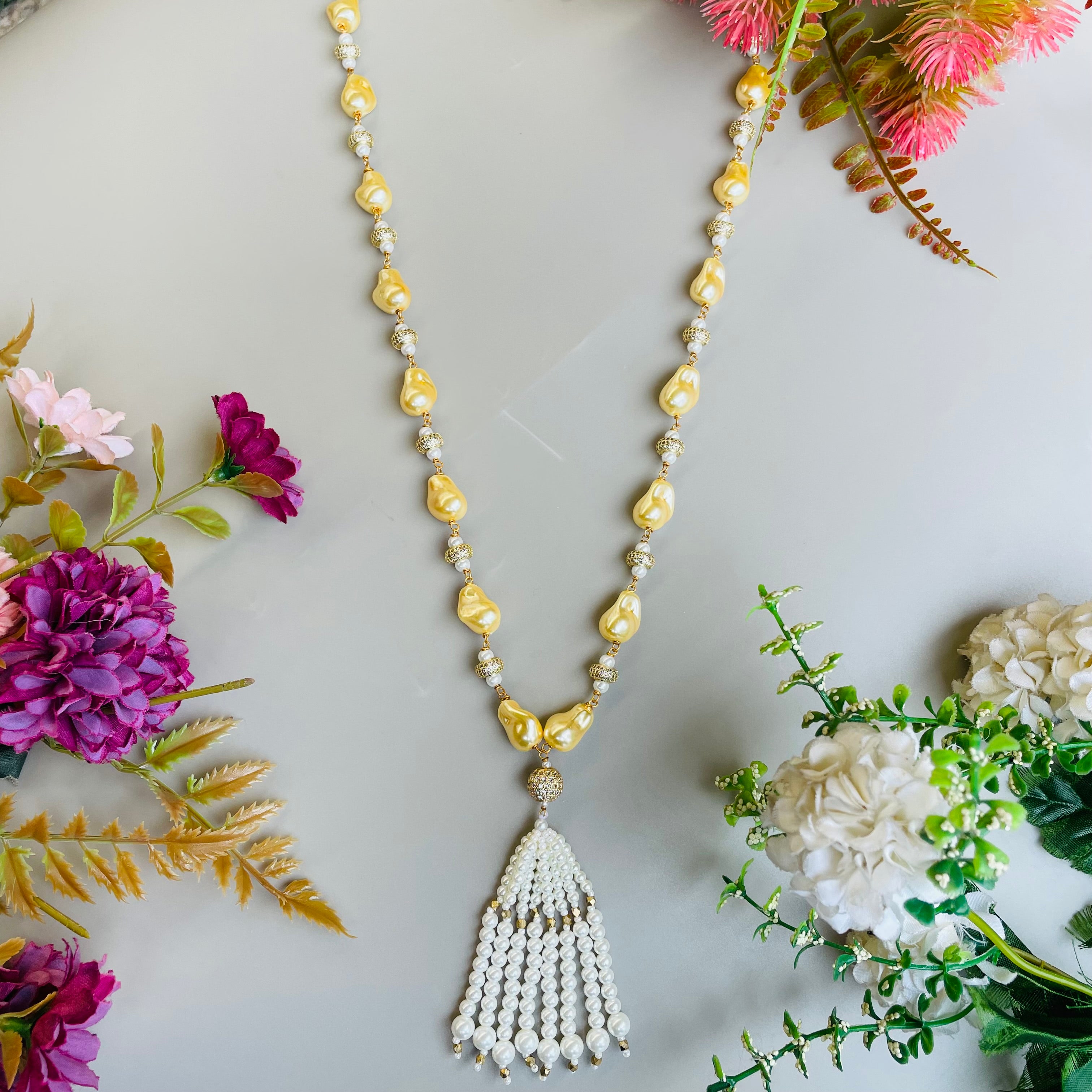 Ad Navya pearl mala